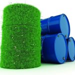 3D_rendering_barrels_covered_with_green_grass_with_biofuels