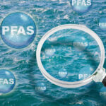 PFAS_Contamination_-_Alertness_about_dangerous_PFAS_per-and_polyfluoroalkyl_substances_into_the_sea_waters_-_They_are_now_everywhere,_so_much_so_that_they_have_even_been_found_in_marine_aerosol_-_Concept_with_magnifying_glass