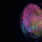 Close_up_beautiful_abstract_multi_colored_fingerprint_on__background_texture_for_design._Macro_photography_view.