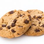 Chocolate_chip_cookie_on_white_background._