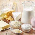 Various_fresh_dairy_products_on_wooden_background